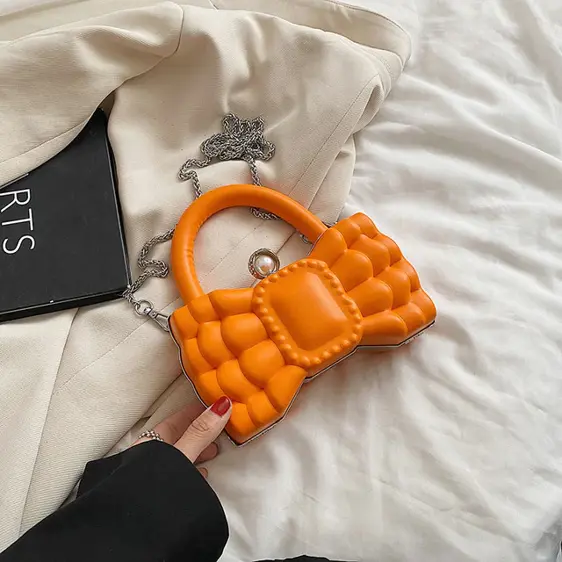Lovely Orange Bow-Shaped Pearl Lock Shoulder Bag