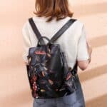 Charming Feather Pattern Black Lady Backpack